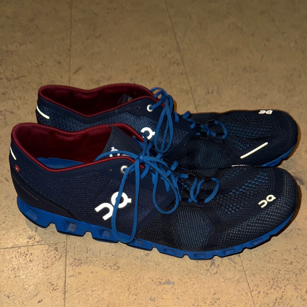 On Running Navy and Red Sneakers
